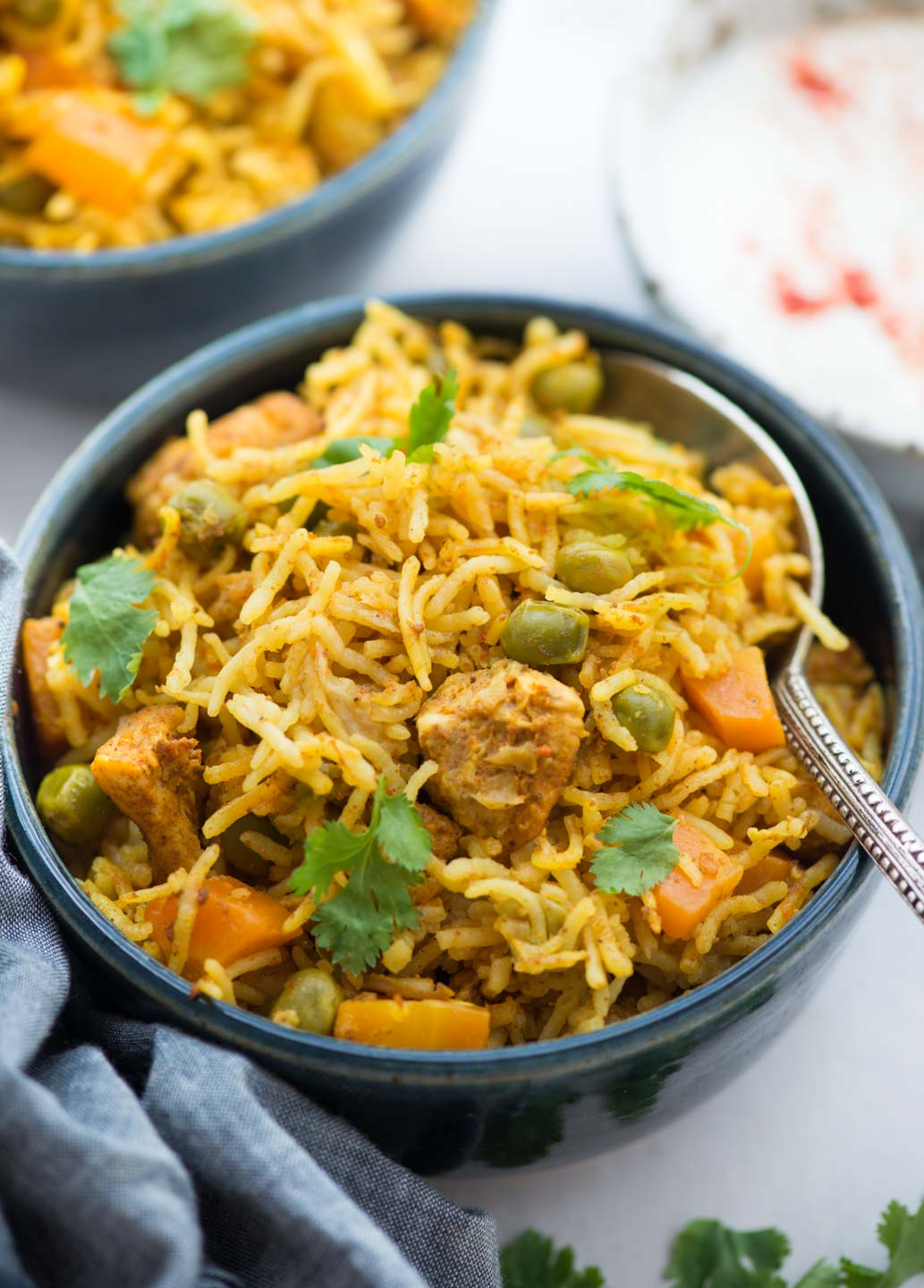 Instant Pot Chicken and rice, curried chicken and rice made in the Instant Pot is flavoured with garlic, ginger and curry powder. Fluffy basmati rice, chicken, carrot, peas, this wholesome meal is definitely going to impress you.