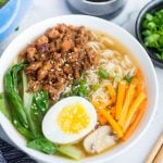 Spicy Pork Ramen takes less than 20 minutes to make. A really flavourful broth with a secret ingredient for extra depth of flavour, ramen noodles, spicy pork is comfort in a bowl, especially for cold winter days.
