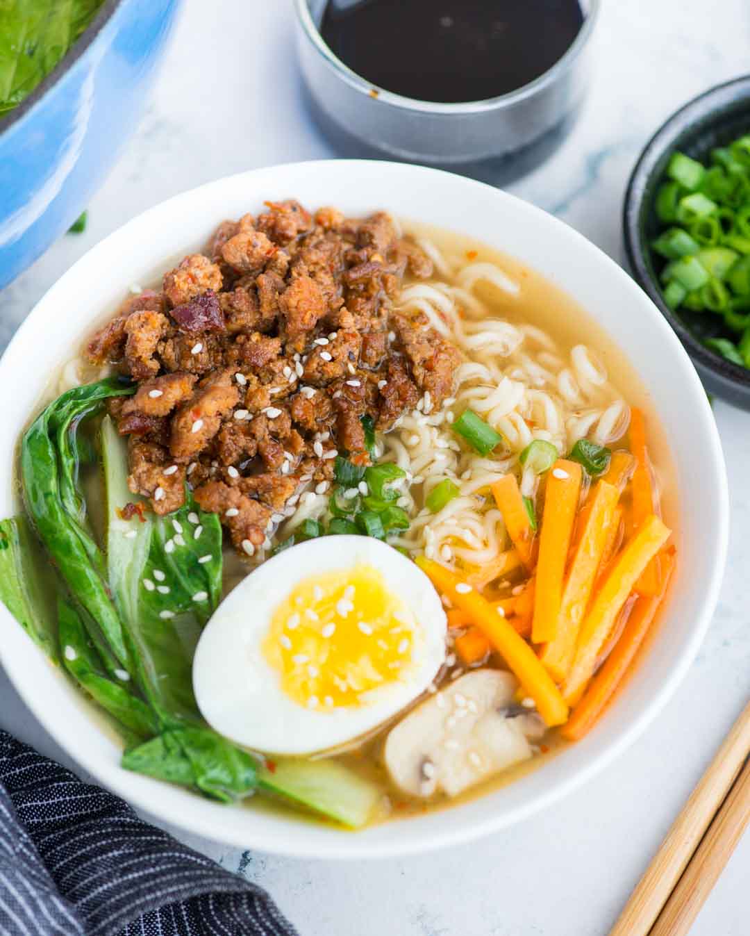 This Ramen recipe takes less than 20 minutes to make. Pork ramen with a really flavourful broth with a secret ingredient for extra depth of flavor, ramen noodles, spicy pork is comfort in a bowl, especially for cold winter days.