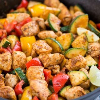 Cajun Chicken with vegetables is a smokey, flavourful one-skillet meal, with juicy chicken and lots of vegetables. Takes only 15 minutes to make and a perfect busy day dinner for the family.