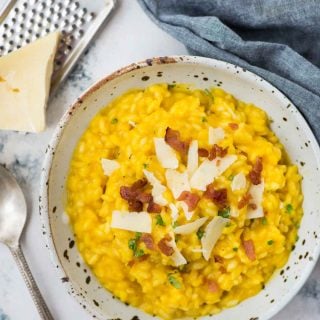 Creamy Butternut Squash Risotto, a classic Italian rice dish with arborio rice, Butternut squash puree, nutmeg, white wine and Parmesan cheese. Making restaurant-quality risotto rice at home is easy and takes only 30 minutes.