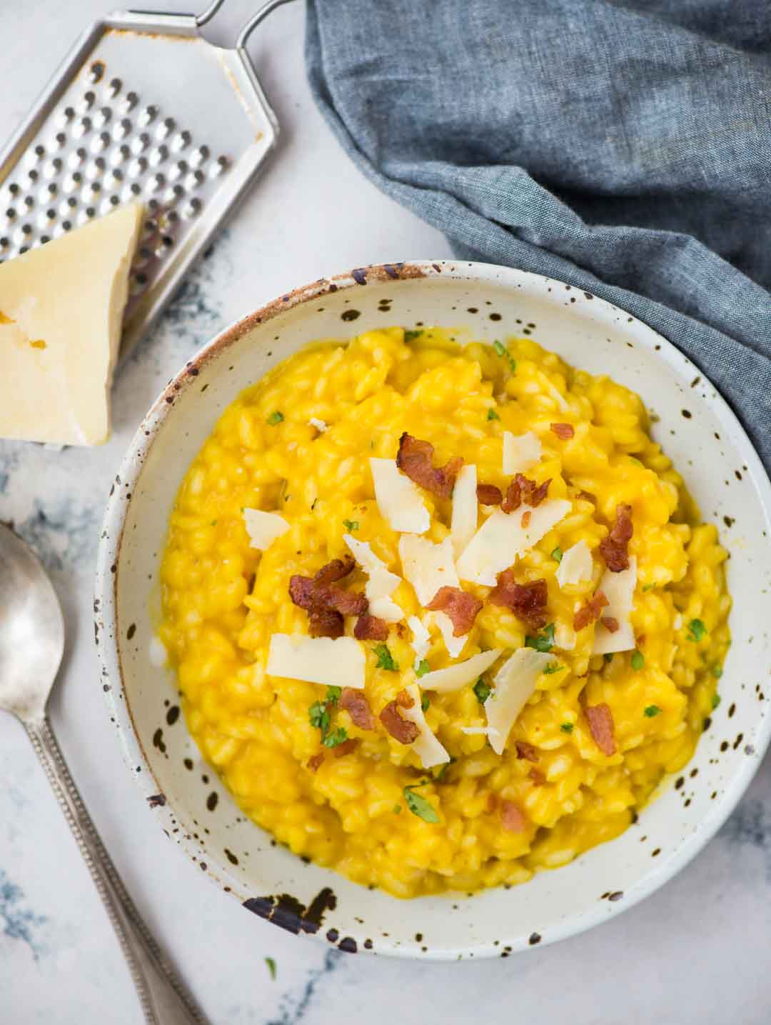 Creamy Butternut Squash Risotto, a classic Italian rice dish with arborio rice, Butternut squash puree, nutmeg, white wine and Parmesan cheese. Making restaurant-quality risotto rice at home is easy and takes only 30 minutes.