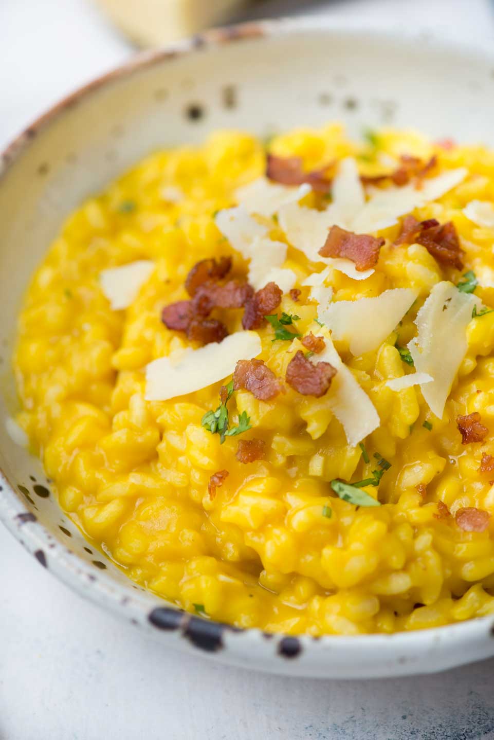 Creamy Butternut Squash Risotto, a classic Italian rice dish with arborio rice, Butternut squash puree, nutmeg, white wine and Parmesan cheese. Making restaurant-quality risotto rice at home is easy and takes only 30 minutes.