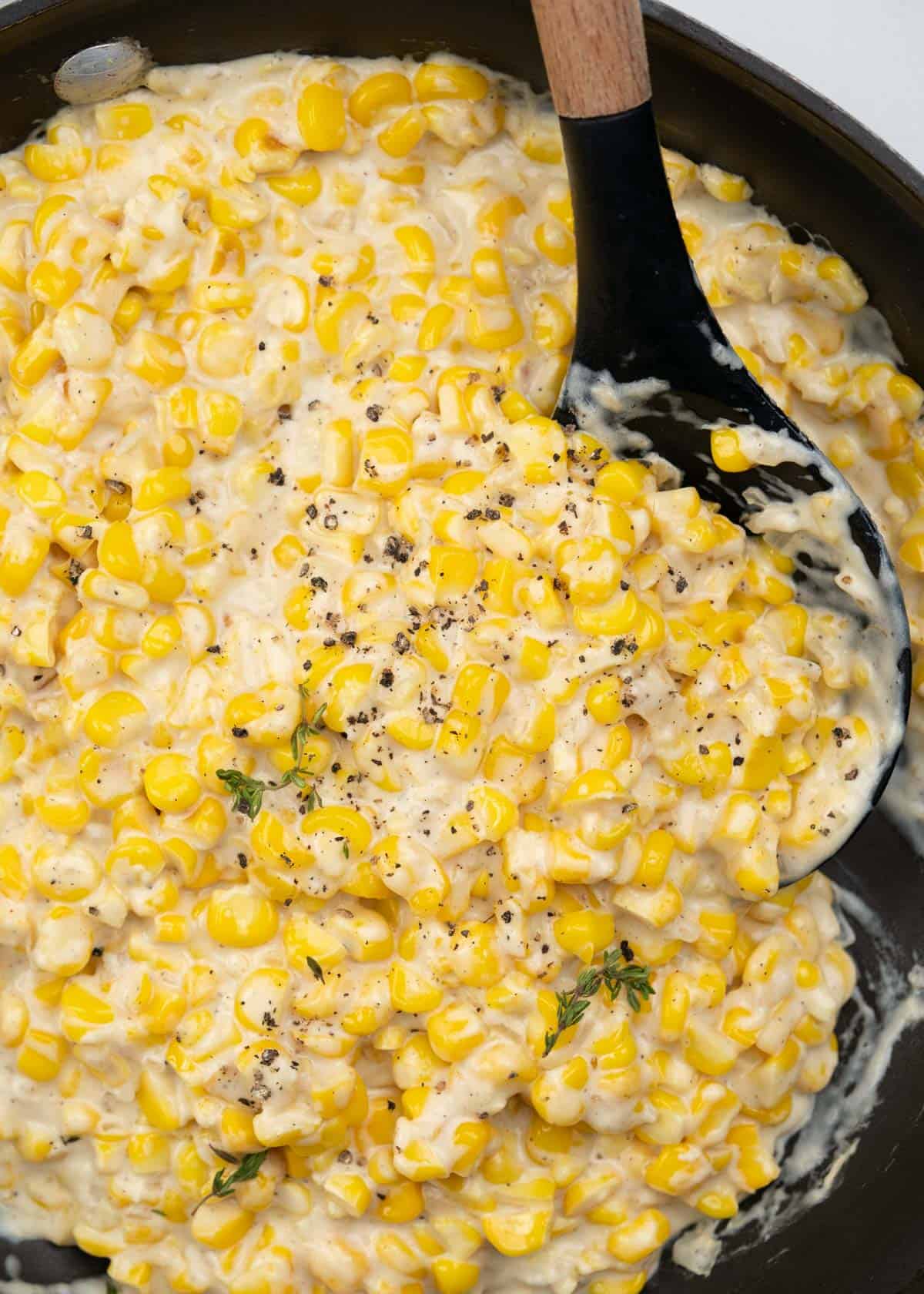 Homemade creamed corn made with fresh/frozen corn, butter, flour. half&half. 