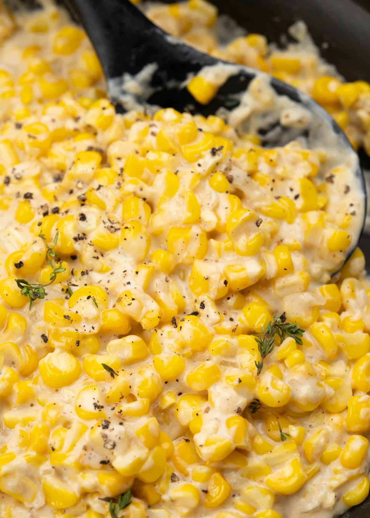 Homemade creamed corn made with fresh/frozen corn, butter, flour. half&half. 