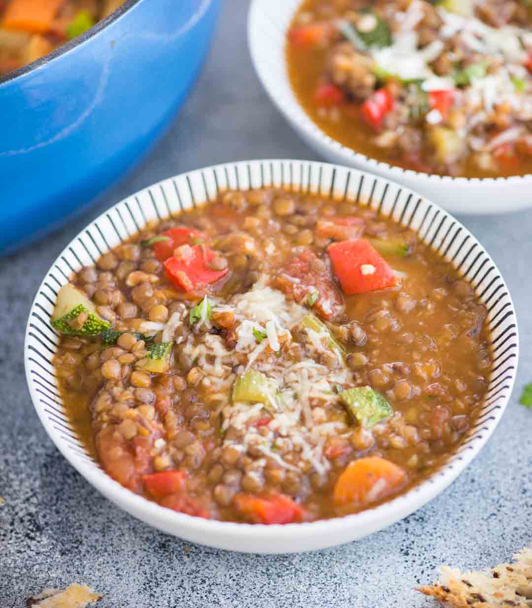 Lentil Soup with array load of vegetables is a filling one-pot vegan meal. Made with Lentils, Zucchini, Carrot, Celery, this soup is loaded with plant-based protein and fiber.