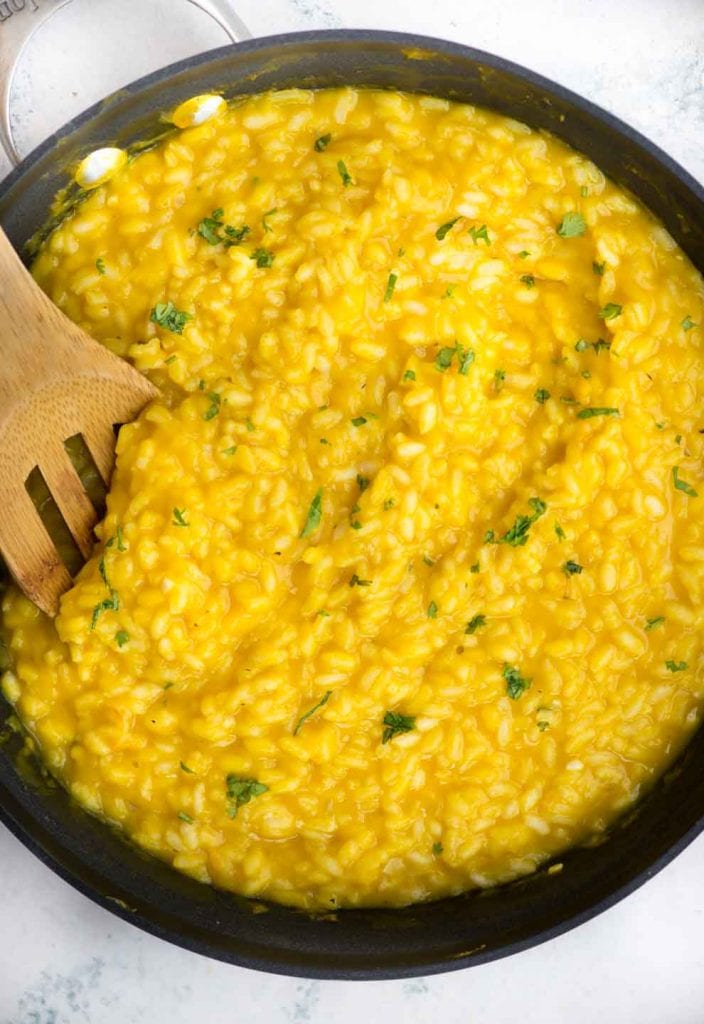 Creamy Butternut Squash Risotto, a classic Italian rice dish with arborio rice, Butternut squash puree, nutmeg, white wine and Parmesan cheese. Making restaurant-quality risotto rice at home is easy and takes only 30 minutes.