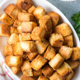 These buttery Crunchy homemade croutons are going to be a game changer for your soups and salads. Easy to make, tastes amazing and can be made in different flavours. 