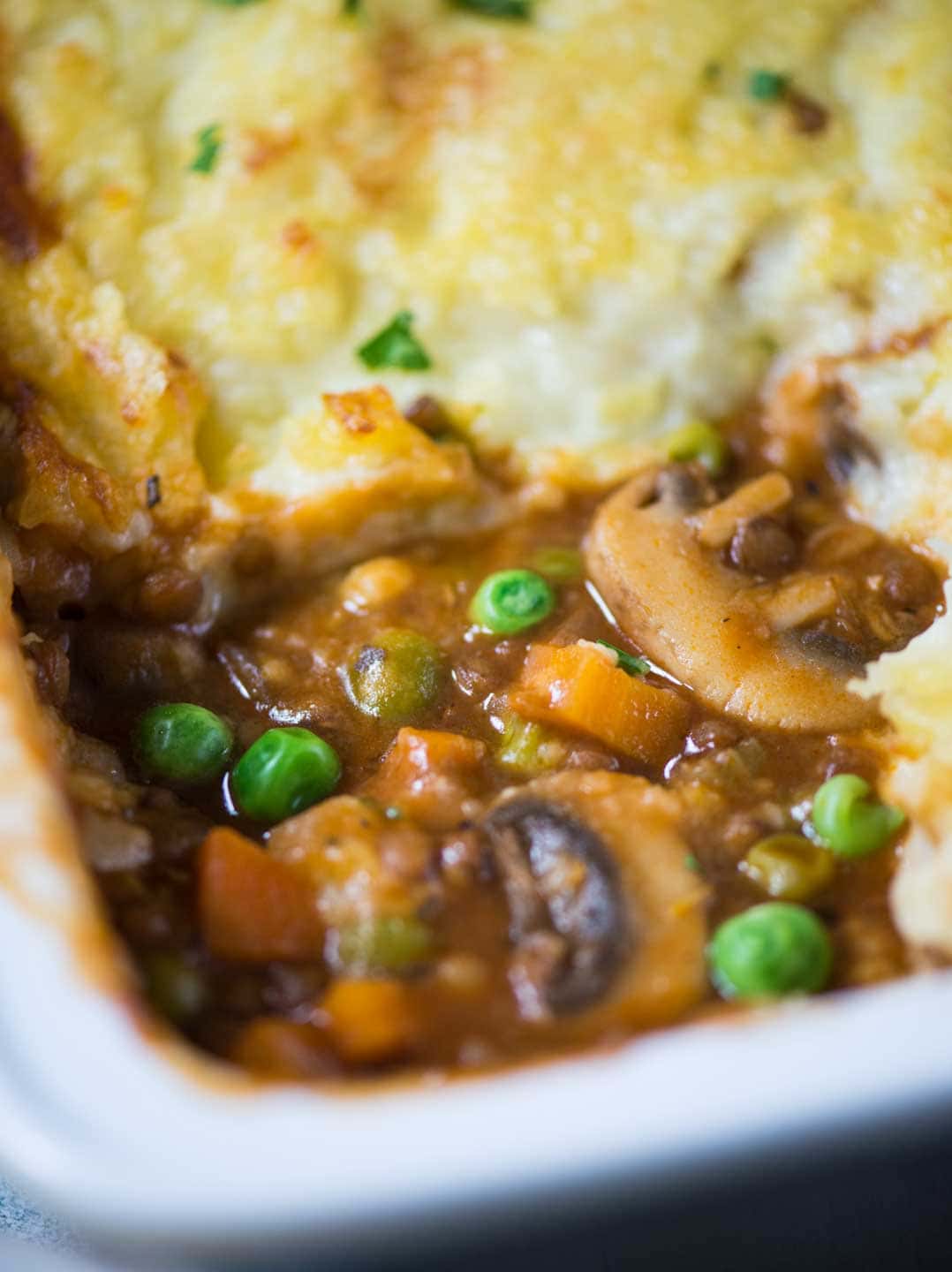Warm and cosy Vegetarian Shepherd's Pie has a meaty texture from Lentils and vegetables, a flavourful wine-based gravy and then topped with a creamy layer of mashed potato.