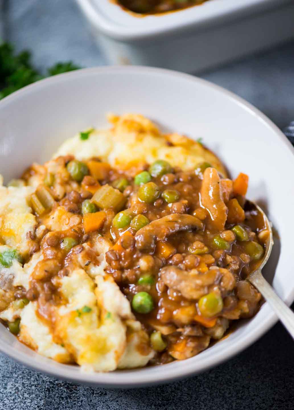 Warm and cosy Vegetarian Shepherd's Pie has a meaty texture from Lentils and vegetables, a flavourful wine-based gravy and then topped with a creamy layer of mashed potato.