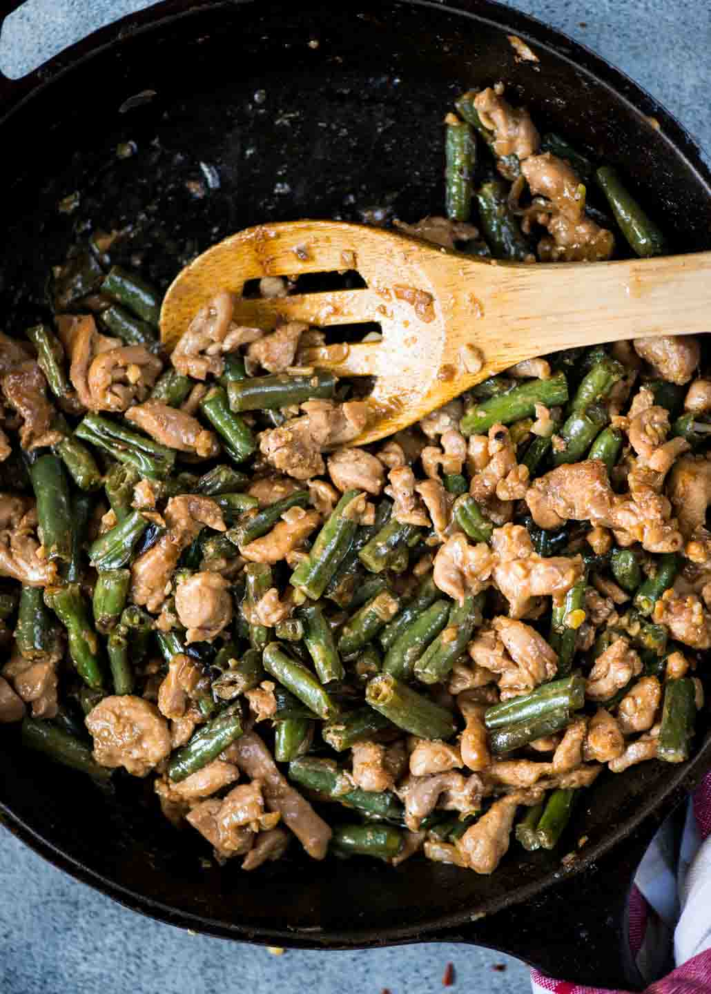 Packed with umami, this Chicken and Beans Stir Fry made with Chicken thighs, green beans tossed in a flavorful stir fry sauce.