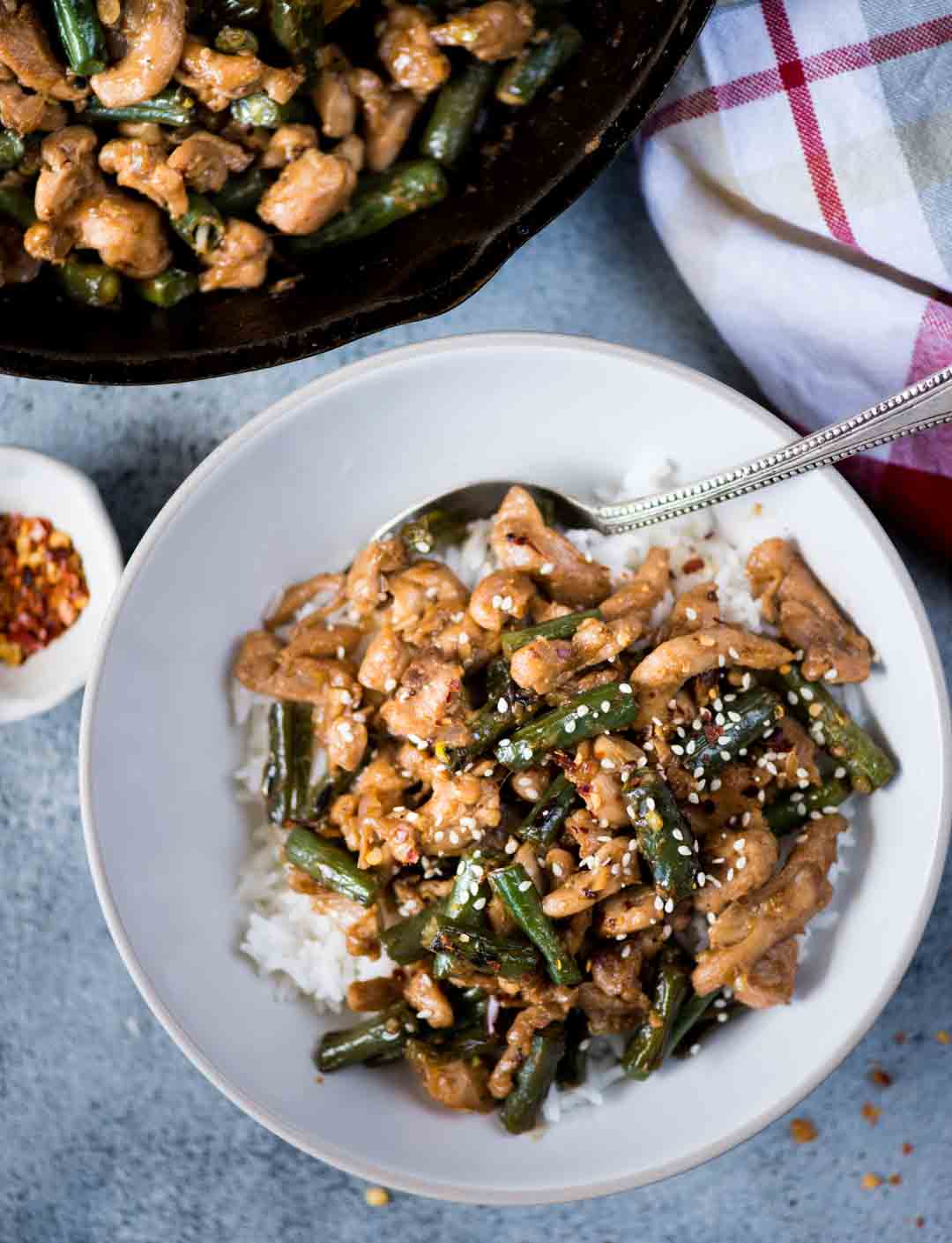 Packed with umami, this Chicken and Beans Stir Fry made with Chicken thighs, green beans tossed in a flavorful stir fry sauce.