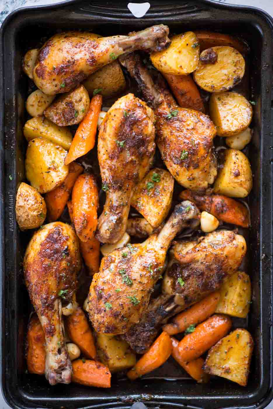 This baked Chicken legs with vegetable is a delicious one-pan dinner with minimal effort. Chicken and vegetables tossed in a ranch marinade and cooked until tender and juicy.