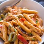 Chicken Fajita Pasta is a one-pot dinner that takes 30 minutes to make. Creamy pasta with chicken, peppers, onion and fajita seasoning, you would fall in love with this easy pasta recipe.