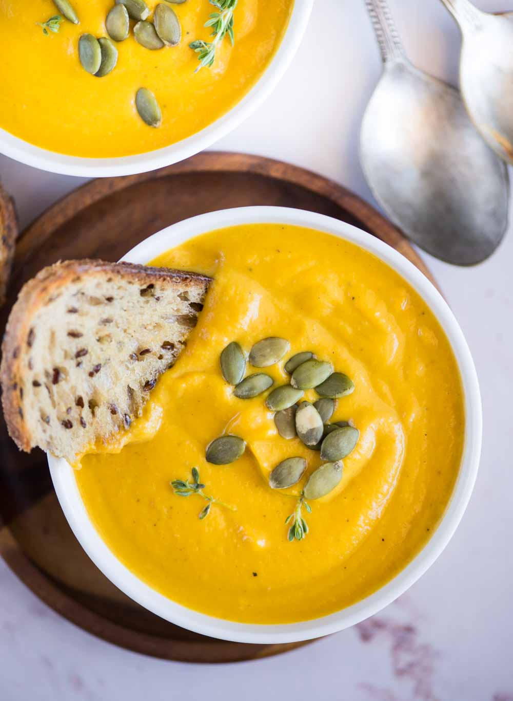 Pumpkin Soup is velvety smooth and creamy without oodles of cream in it. The taste of pumpkin really shines through this healthy soup.