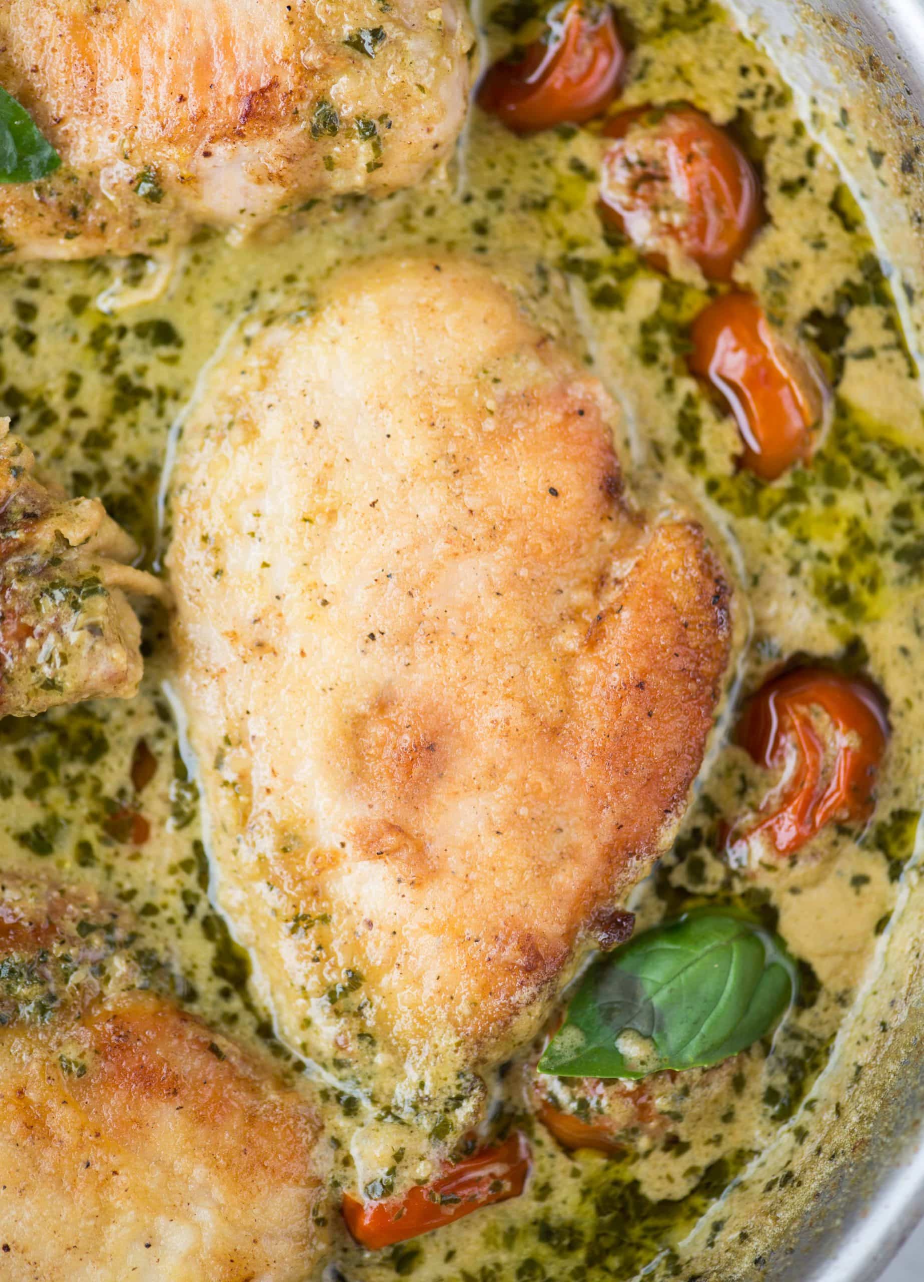Pesto Chicken in a light and creamy sauce is packed with flavor that takes less than 30 minutes to make. Toss some pasta in the sauce and a delicious dinner is on the table in no time. 