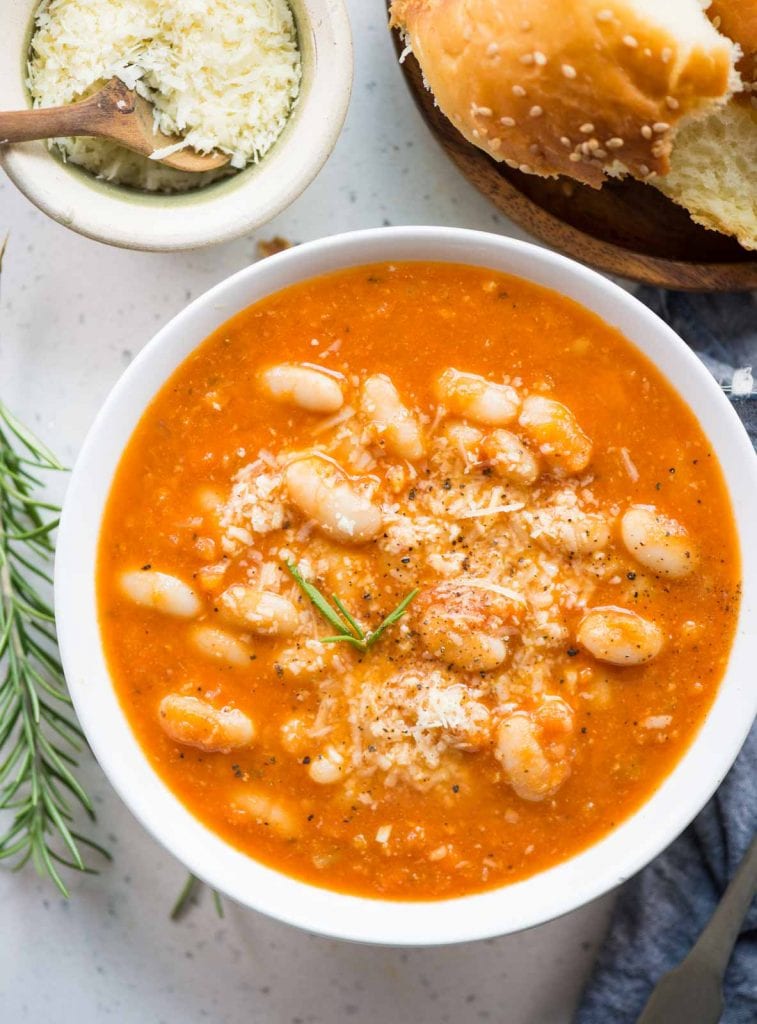 Top shot of tomato white bean soup served in a bowl 