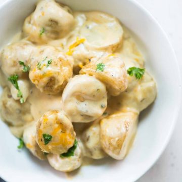 Baked Ranch potatoes in a cheesy creamy sauce is a delicious side dish made with 5 ingredients and in just 30 minutes.