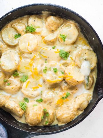 Baked Ranch potatoes in a cheesy creamy sauce is a delicious side dish made with 5 ingredients and in just 30 minutes.