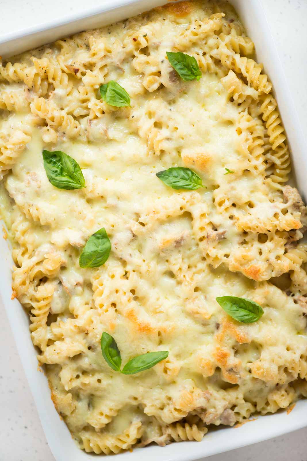 Creamy and indulgent Tuna pasta is a comfort meal that the entire family loves. Canned tuna and pasta tossed in a creamy cheesy sauce and baked until bubbly. 
