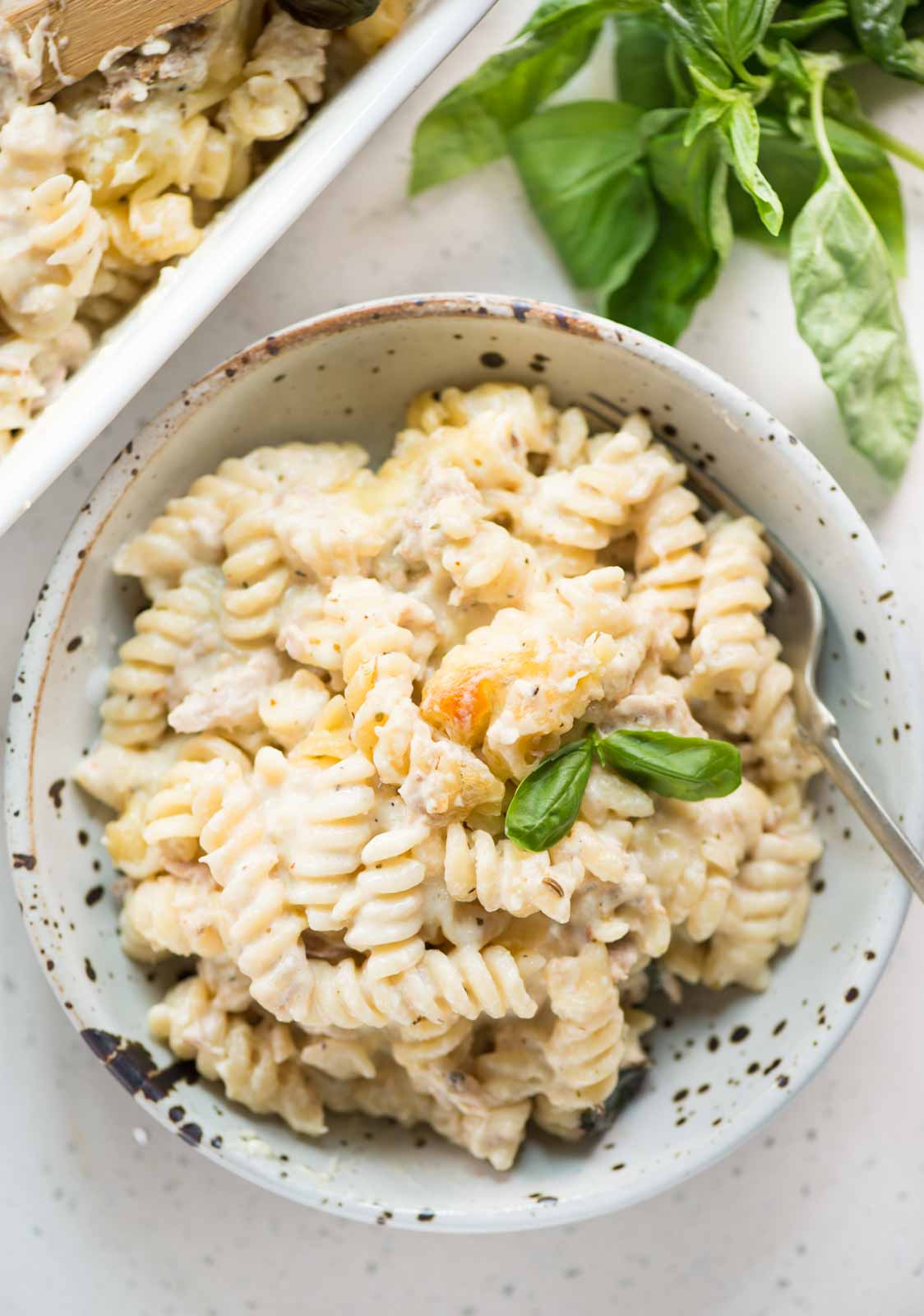 Creamy and indulgent baked pasta with Tuna is a comfort meal that the entire family loves. Canned tuna and pasta tossed in a creamy cheesy sauce and baked until bubbly. 