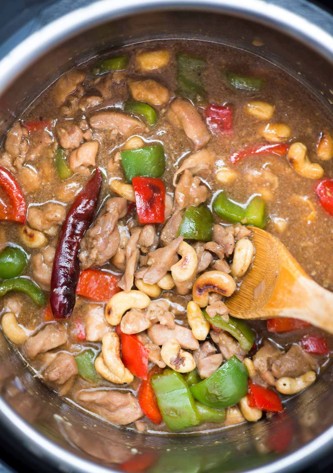 Take away Style Cashew Chicken with crunchy peppers made right in the Instant Pot. This extra saucy Cashew Chicken is pairs really well with rice. You can easily make it on the stovetop as well.  