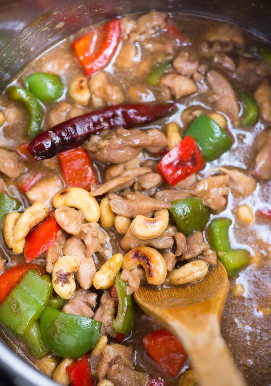 Take away Style Cashew Chicken with crunchy peppers made right in the Instant Pot. This extra saucy Cashew Chicken is pairs really well with rice. You can easily make it on the stovetop as well.  