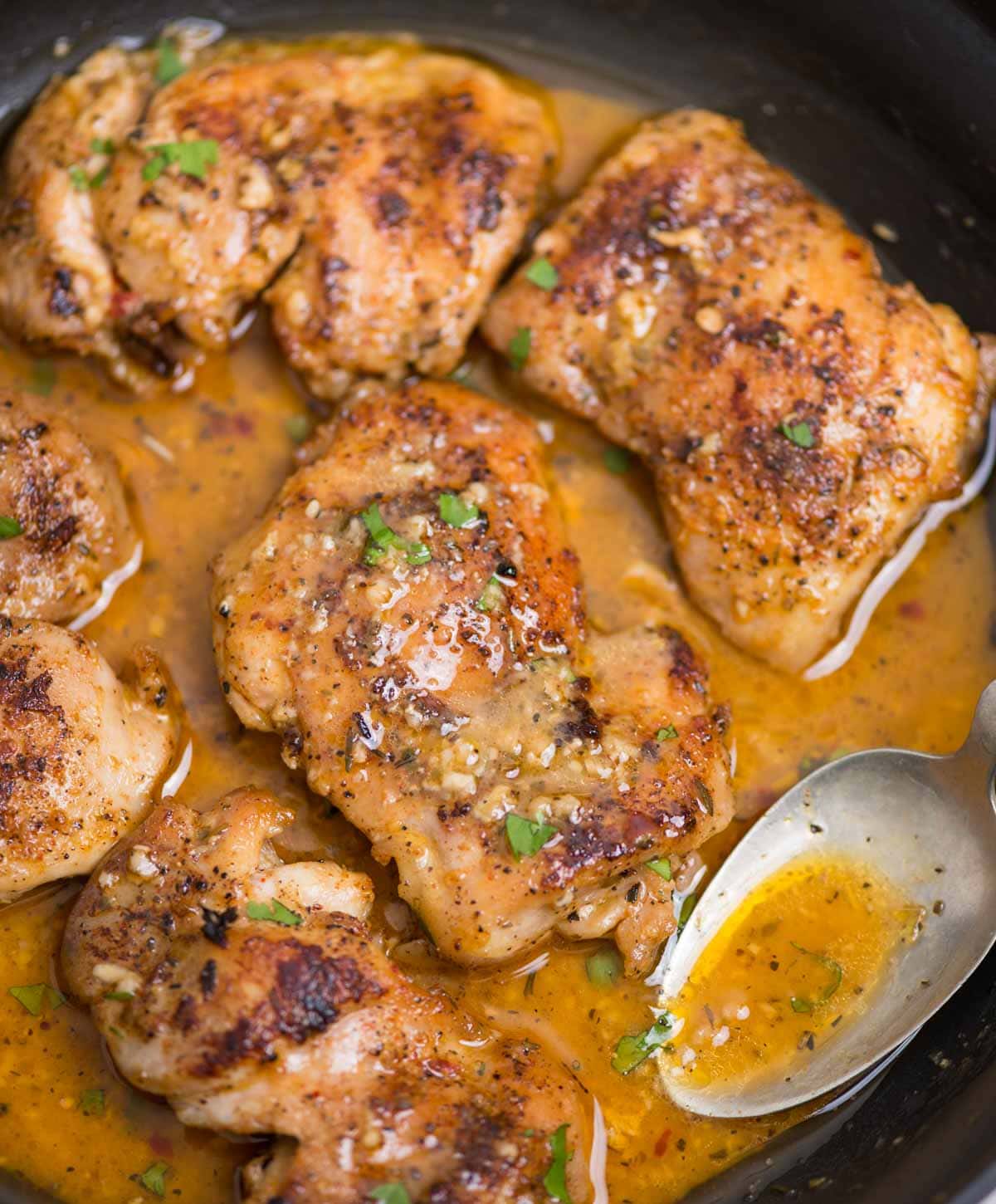 Juicy tender Boneless skinless chicken thighs in butter garlic sauce is crazy delicious. The garlic butter sauce has no cream, no flour yet is so creamy. Make this easy dinner on the stovetop in just 30 minutes. 