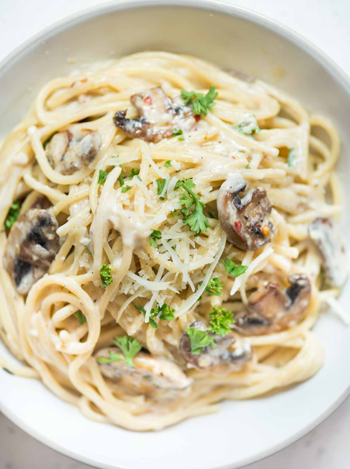 Mushroom Pasta in a creamy parmesan based sauce and caramelized mushroom just the right fit to satisfy the pasta craving. 