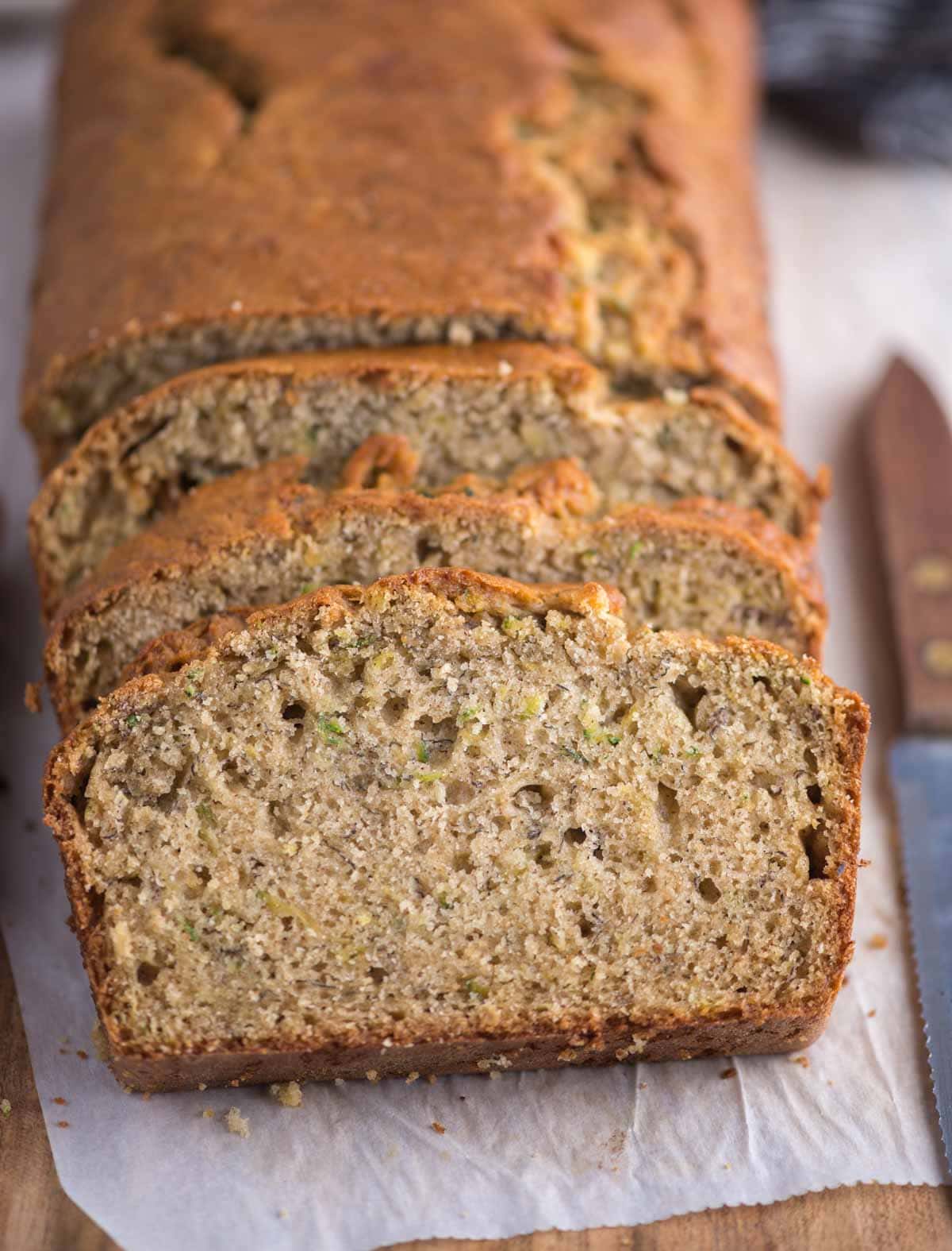 Moist Zucchini Banana Bread, this bread is the best of both worlds. Everyone's favorite banana bread with shredded Zucchini, spiced with ground cinnamon has a moist crumb and really easy to make.