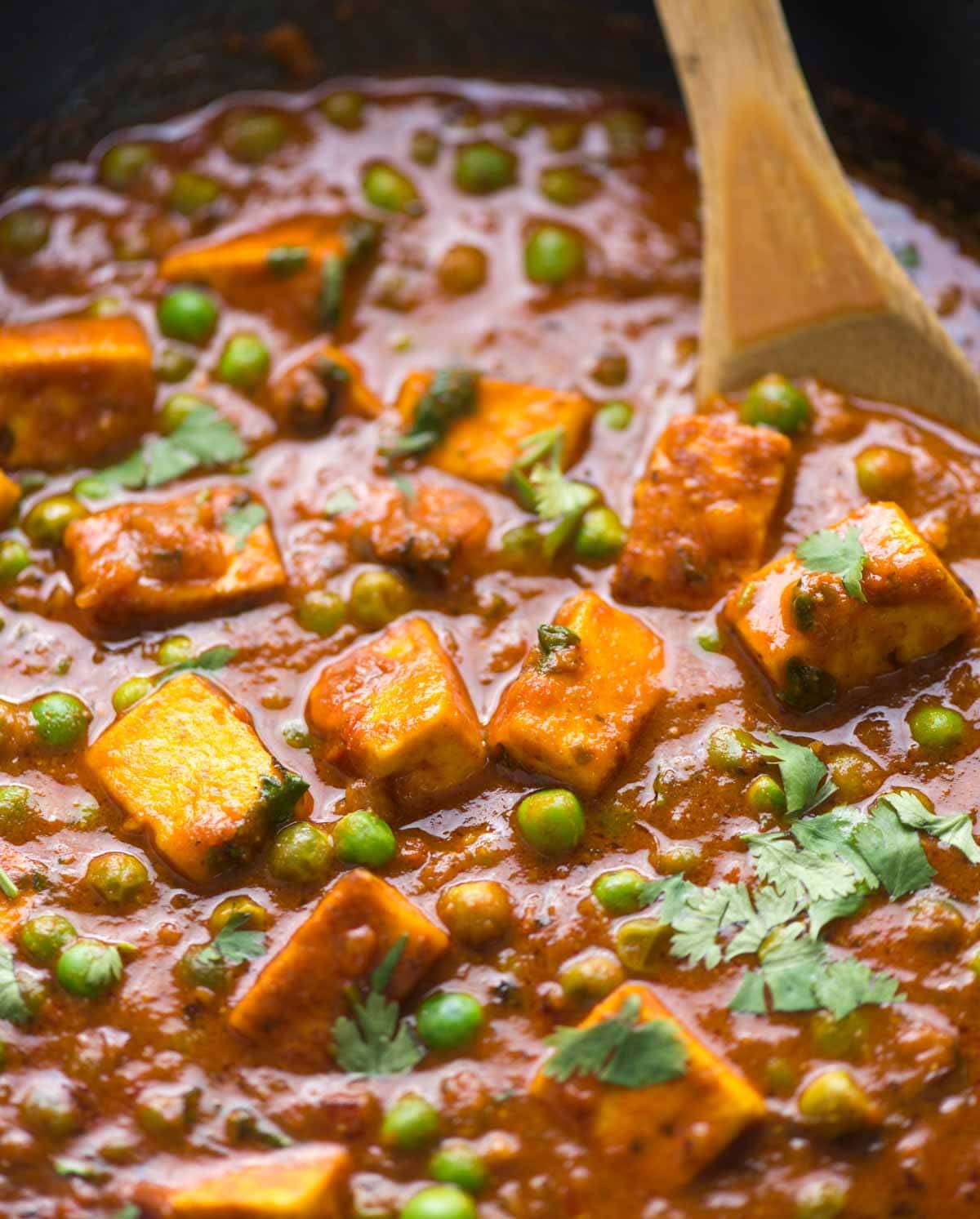 Soft paneer and matar in a flavorful onion tomato gravy, this recipe will remind you of your favorite restaurant for sure. Without any cream or cashew, this curry still is thick and perfect to scoop with roti or naan. 