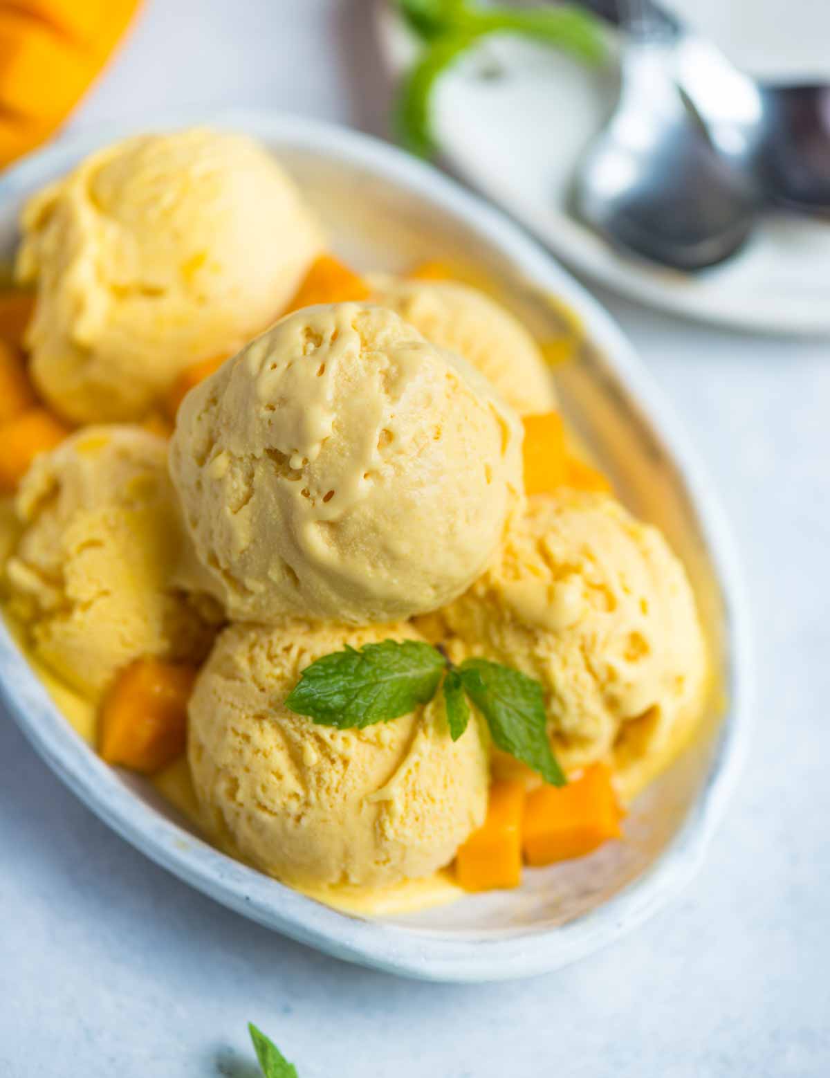Mango Ice Cream is creamy and tastes better than a tub of store brought Ice cream. There is no artificial colour or flavour and you don't even need an Ice cream maker to make it. 