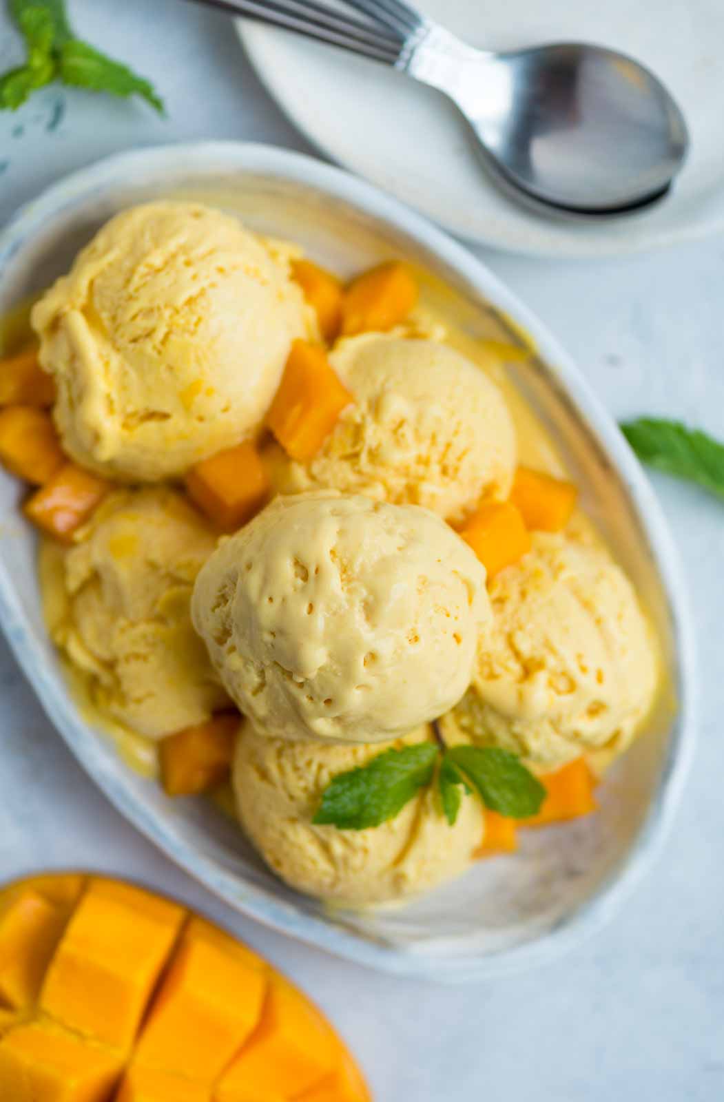 Mango Ice Cream is creamy and tastes better than a tub of store brought Ice cream. There is no artificial colour or flavour and you don't even need an Ice cream maker to make it. 