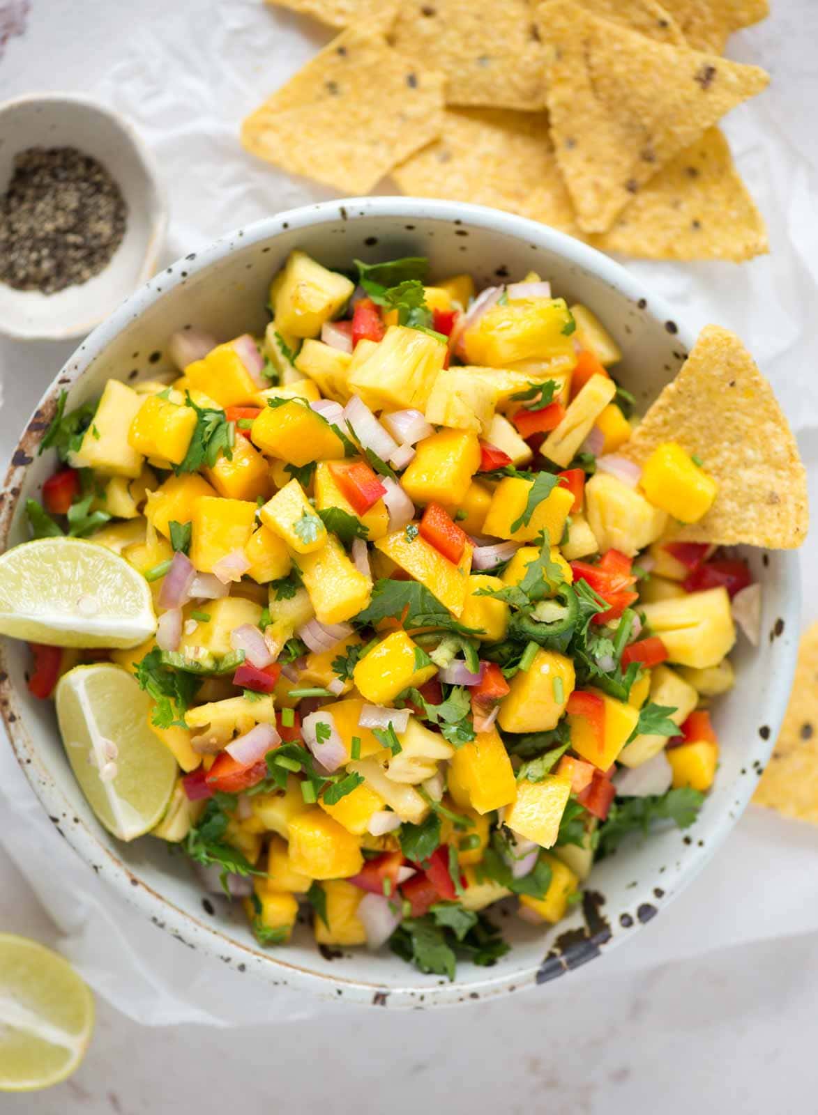 Cover pic shows pineapple mango salsa in a bowl alongside chips