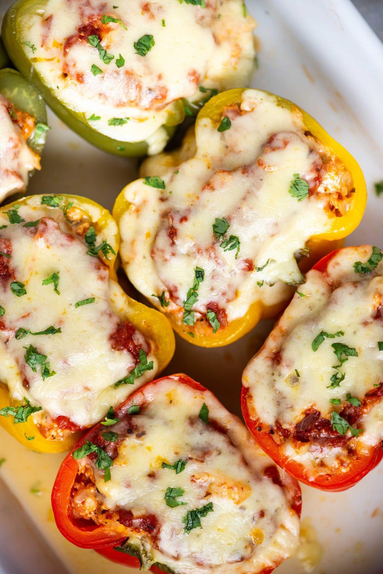 Italian stuffed peppers filled with Chicken, Rice and lots of cheese is a complete meal in itself. The stuffing is moist, tangy and full of Italian flavours