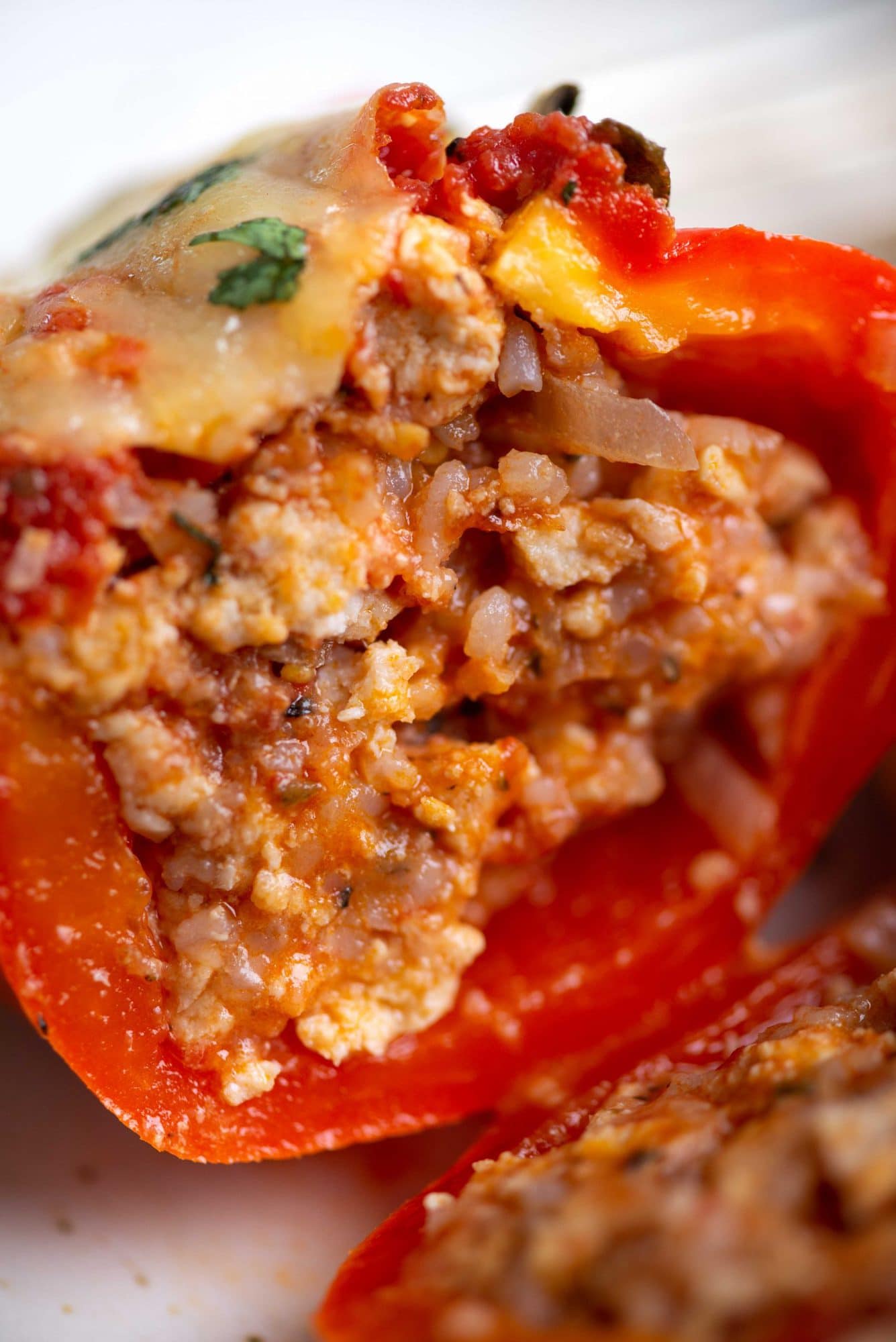 Italian stuffed peppers filled with Chicken, Rice and lots of cheese is a complete meal in itself. The stuffing is moist, tangy and full of Italian flavours