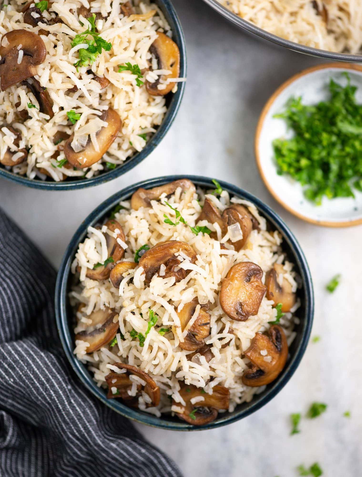 Mushroom rice or pulao or pulav serve in a bowl as a whole meal.