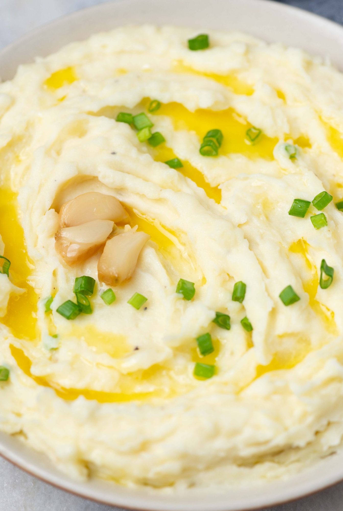 mashed potato elevates everyday mash with the flavor of roasted garlic to a divine side dish to any meat.