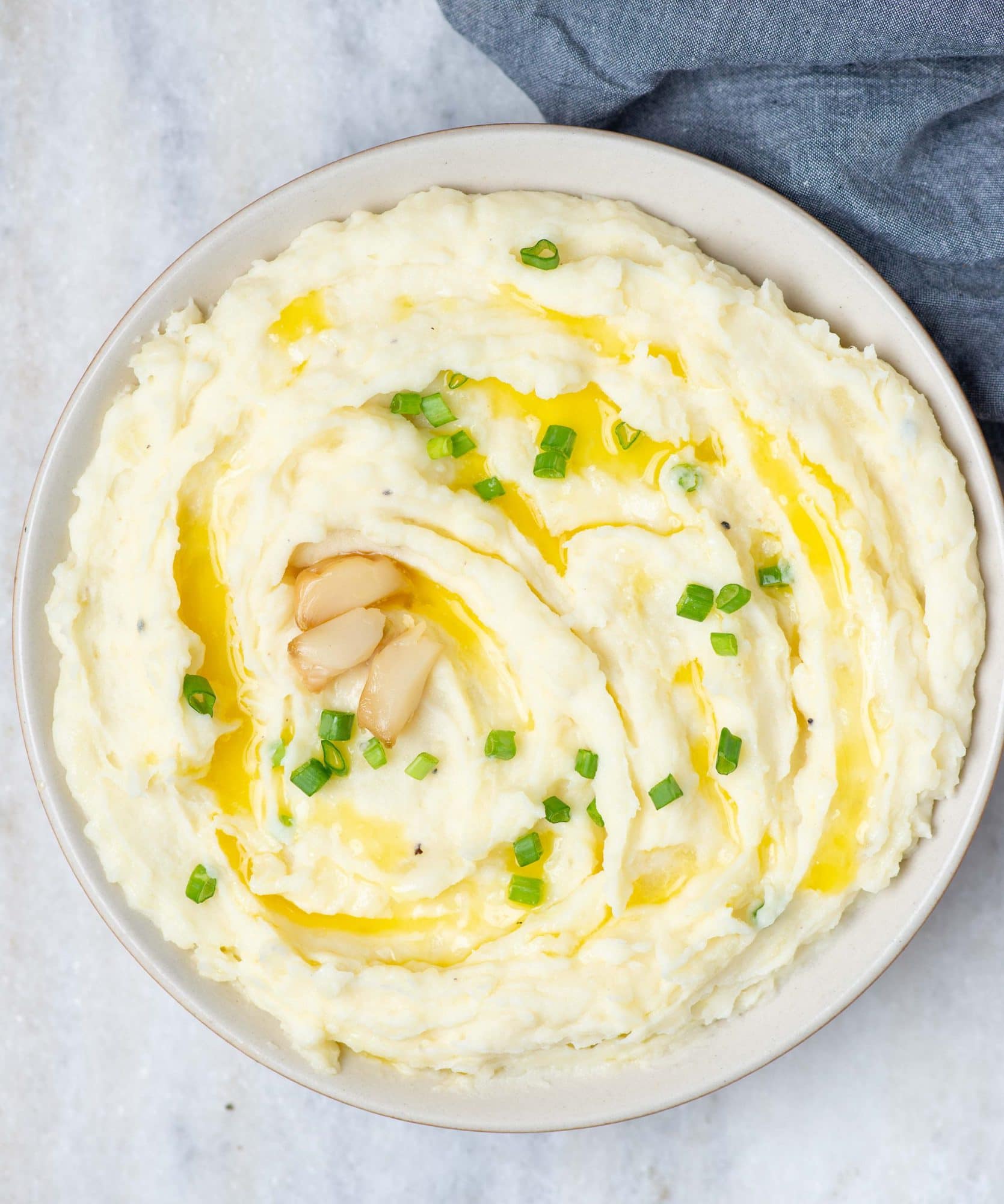 mashed potato elevates everyday mash with the flavor of roasted garlic to a divine side dish to any meat.