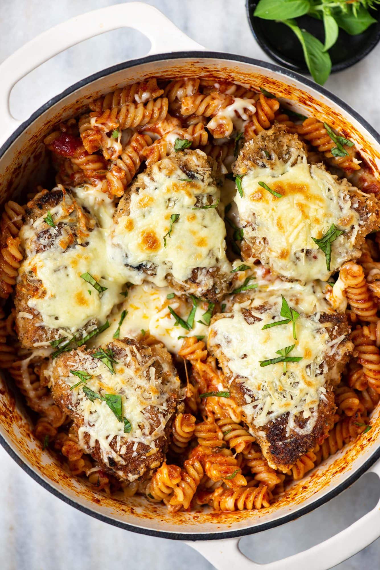 This chicken parmesan pasta has all-time favourite Chicken Parmesan and pasta combined in one dish. An easy one-pot dinner recipe that takes 30 minutes to make and needs minimal cleanup