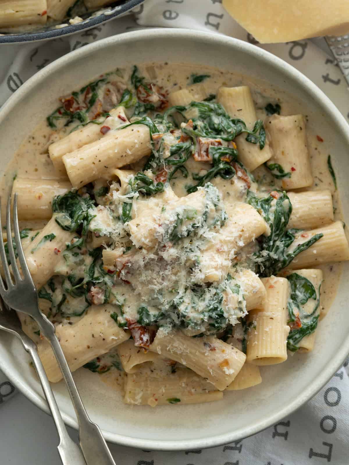 Serving of creamy spinach pasta