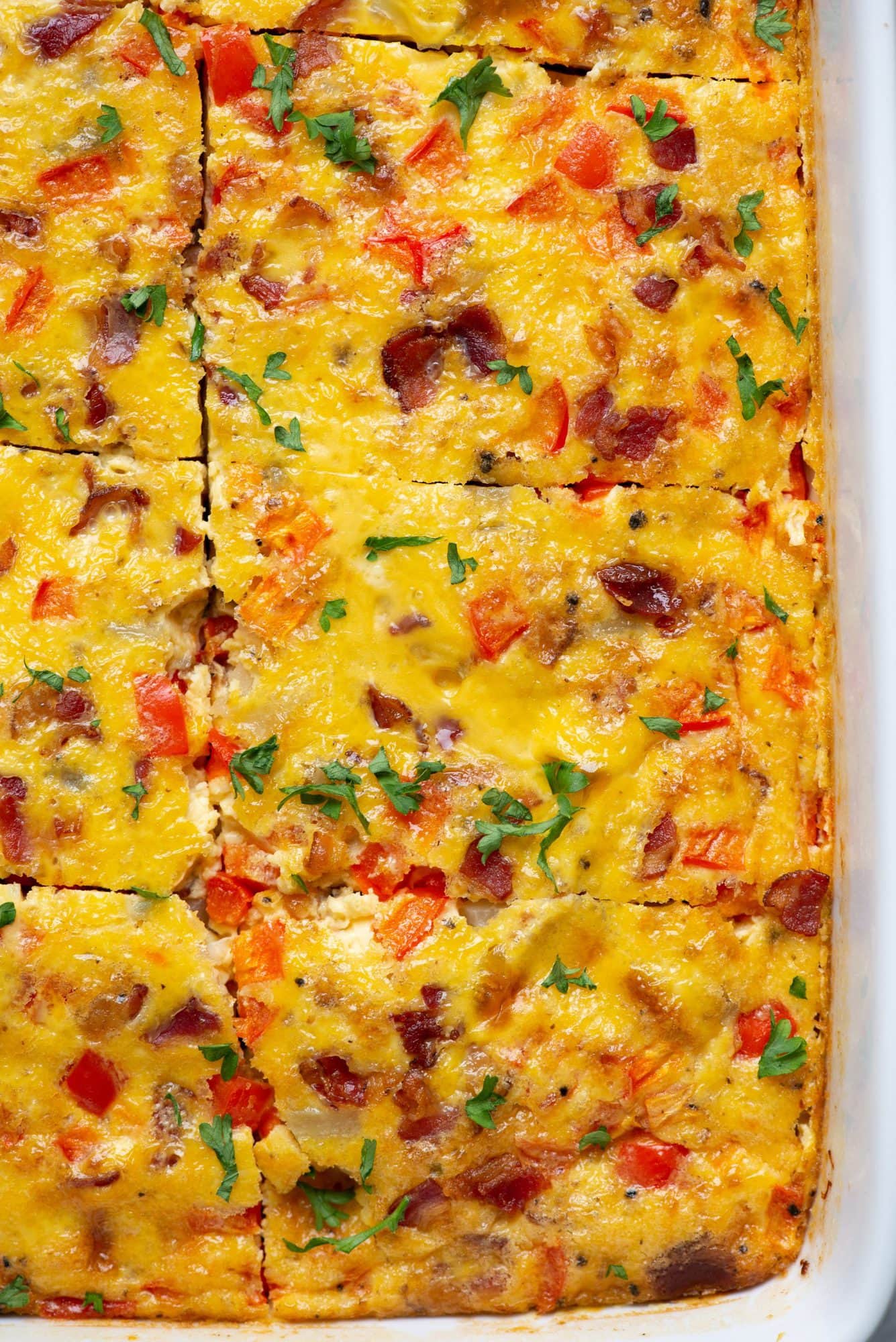 This delicious and filling Potato Casserole is made with eggs, cheese and Bacon. Perfect make-ahead breakfast and can easily feed a crowd. 