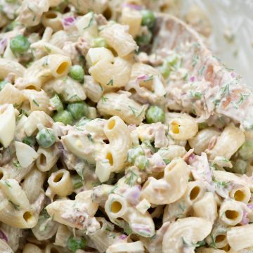 Close up of tuna pasta salad showing a creamy dressing.