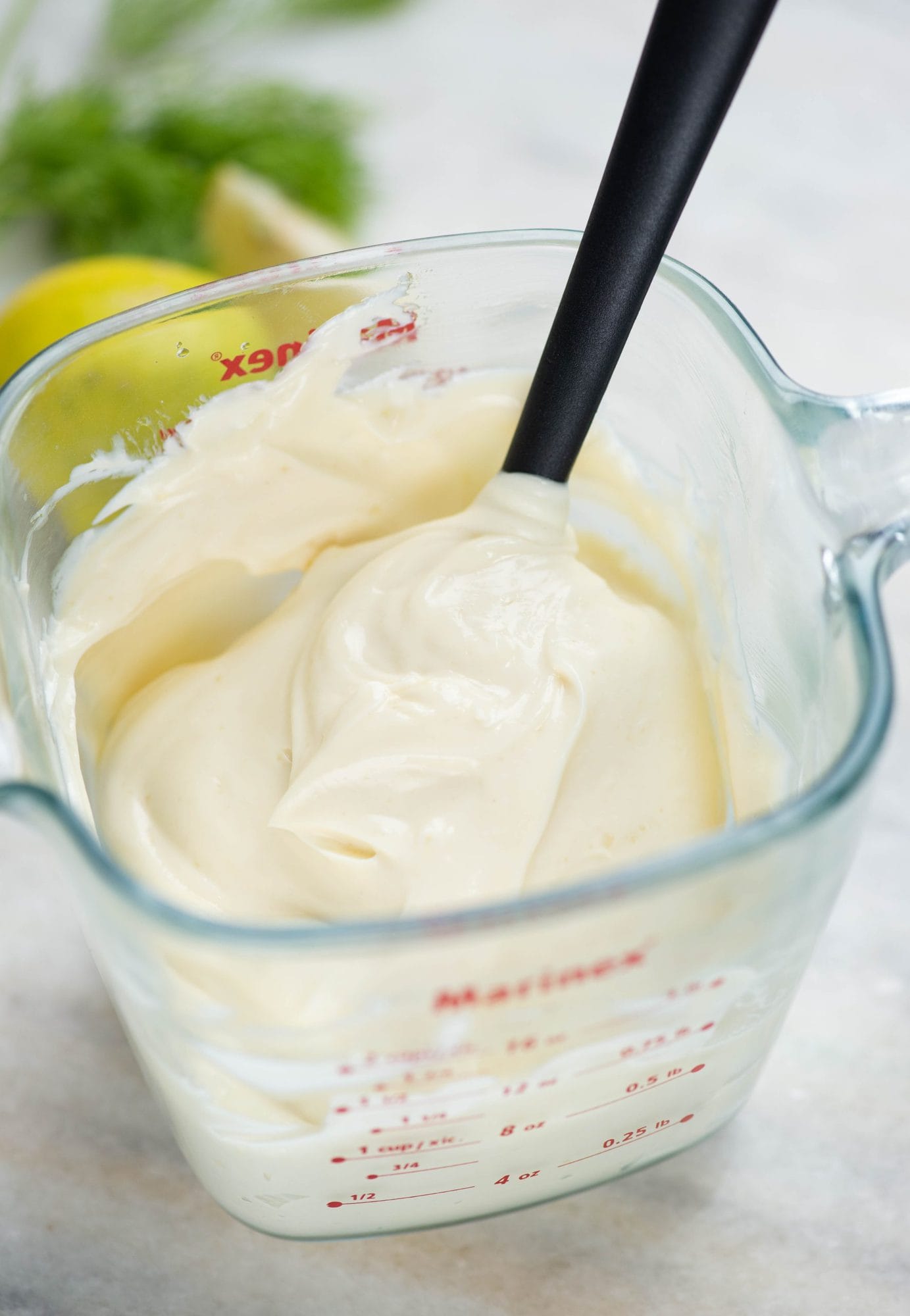 Make fail proof creamy mayonnaise at home with easily available ingredients and a stick blender. 