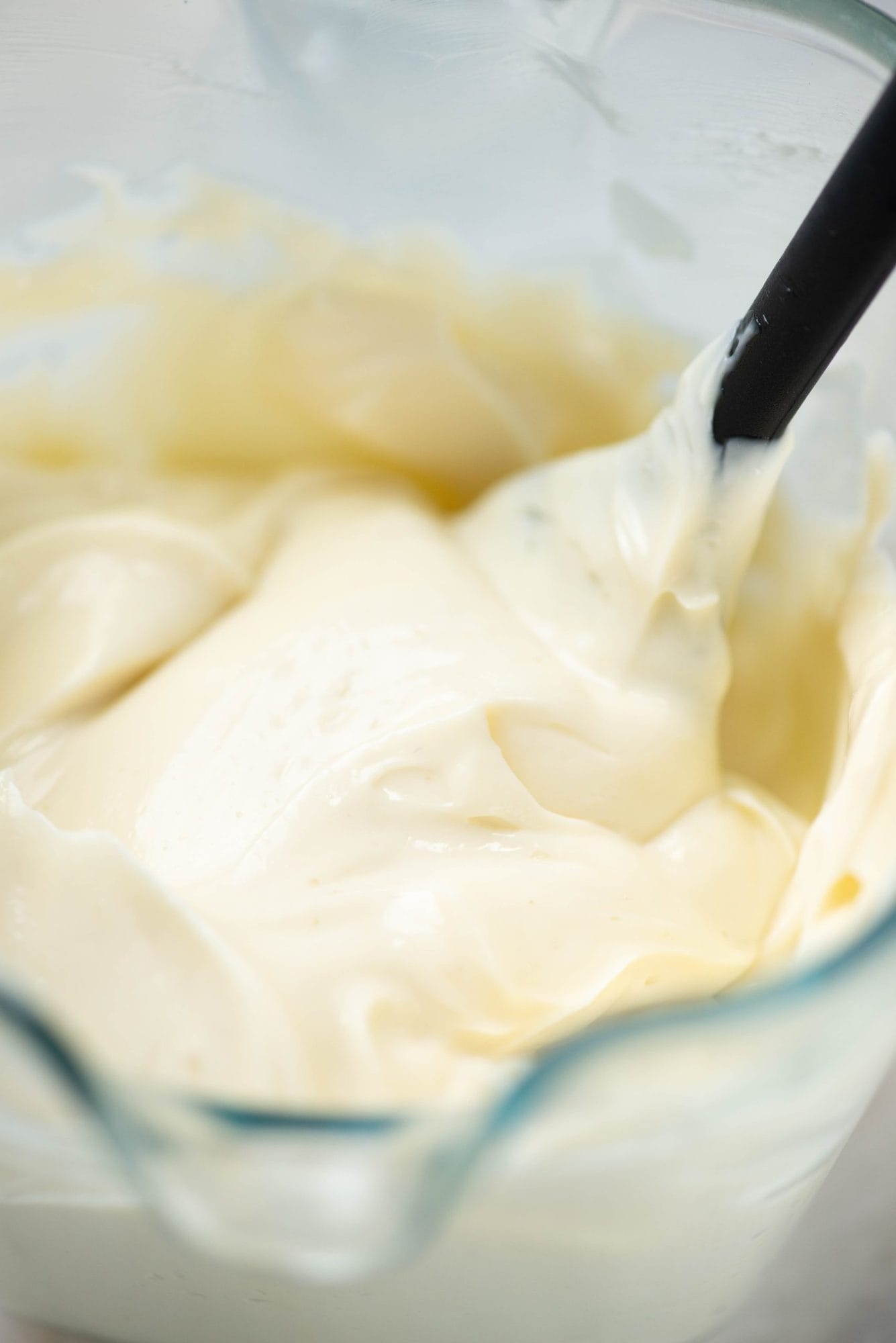 Make fail proof creamy mayonnaise at home with easily available ingredients and a stick blender. 