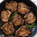 Lamb chops pan-seared and infused with mediterranean flavor from the marinade.