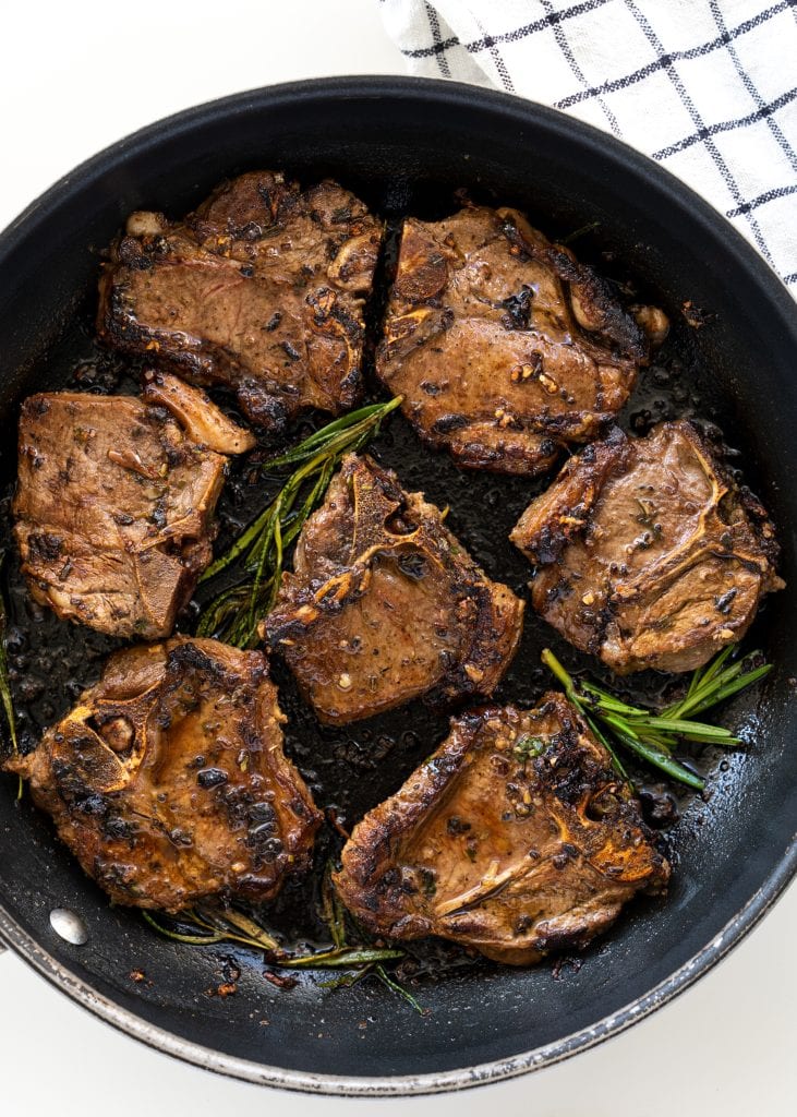 Lamb chops pan-seared and infused with mediterranean flavor from the marinade.