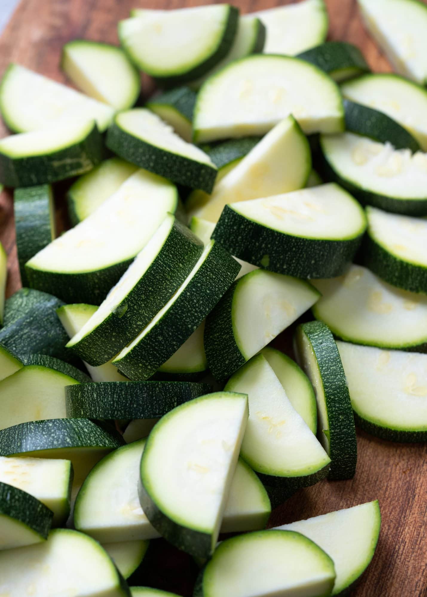 zucchini chopped to coin size and then cut to halves to make oven roasted zucchini.