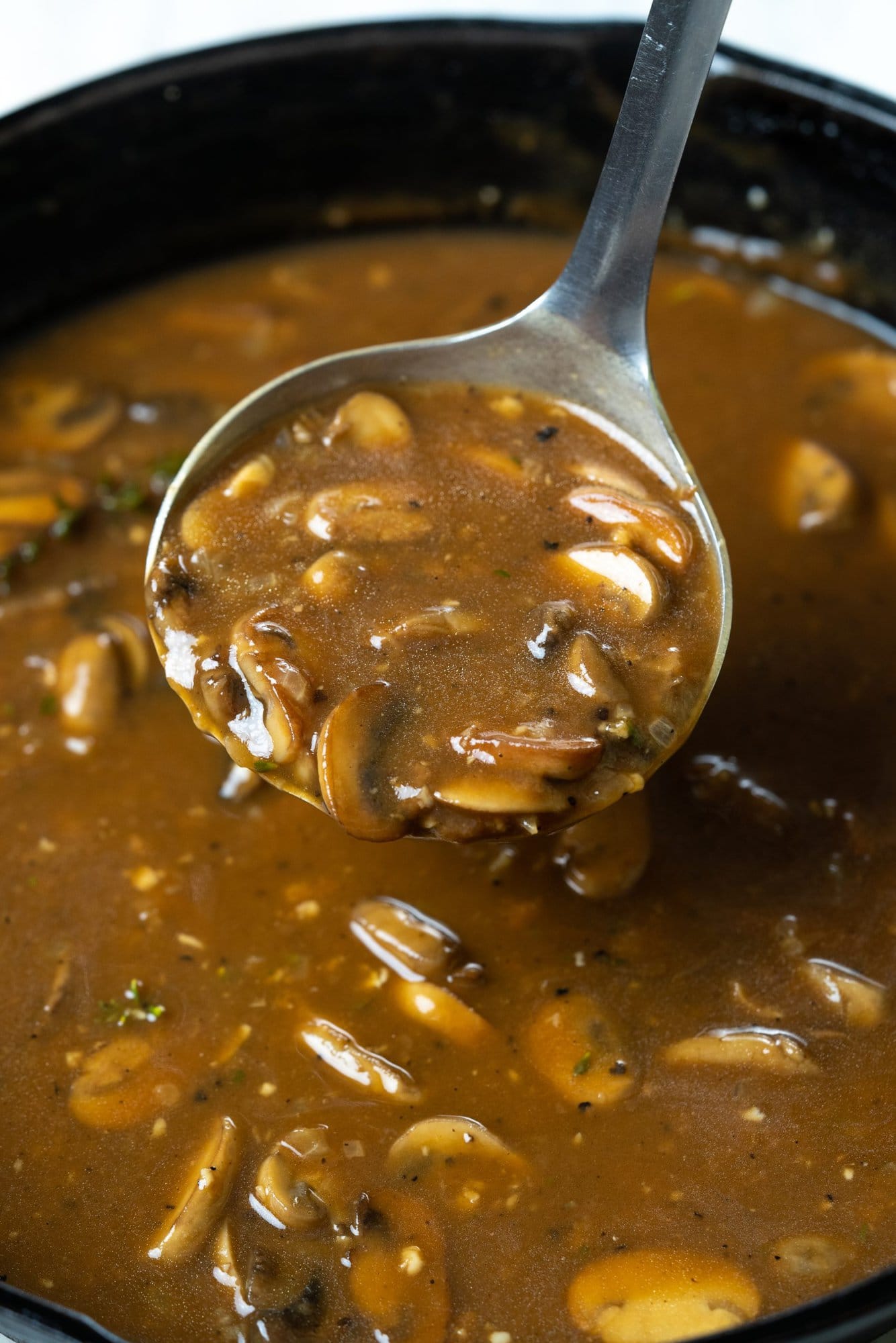 This mushroom gravy is super delicious, easy to make, and has unmistakable umami from a secret ingredient. You can serve it any steak, mashed potato, grilled veggies, or even any bread.