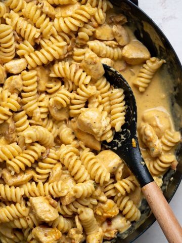 Chicken pasta with creamy cheesy sauce made of ranch seasoning